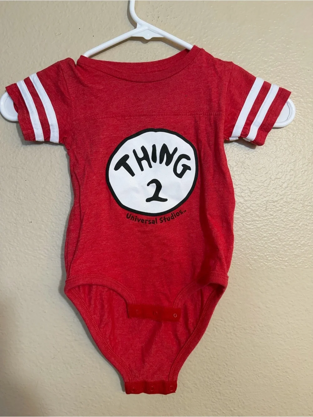 Universal Red 'Thing 2' Baby Bodysuit with White Stripe Sleeves